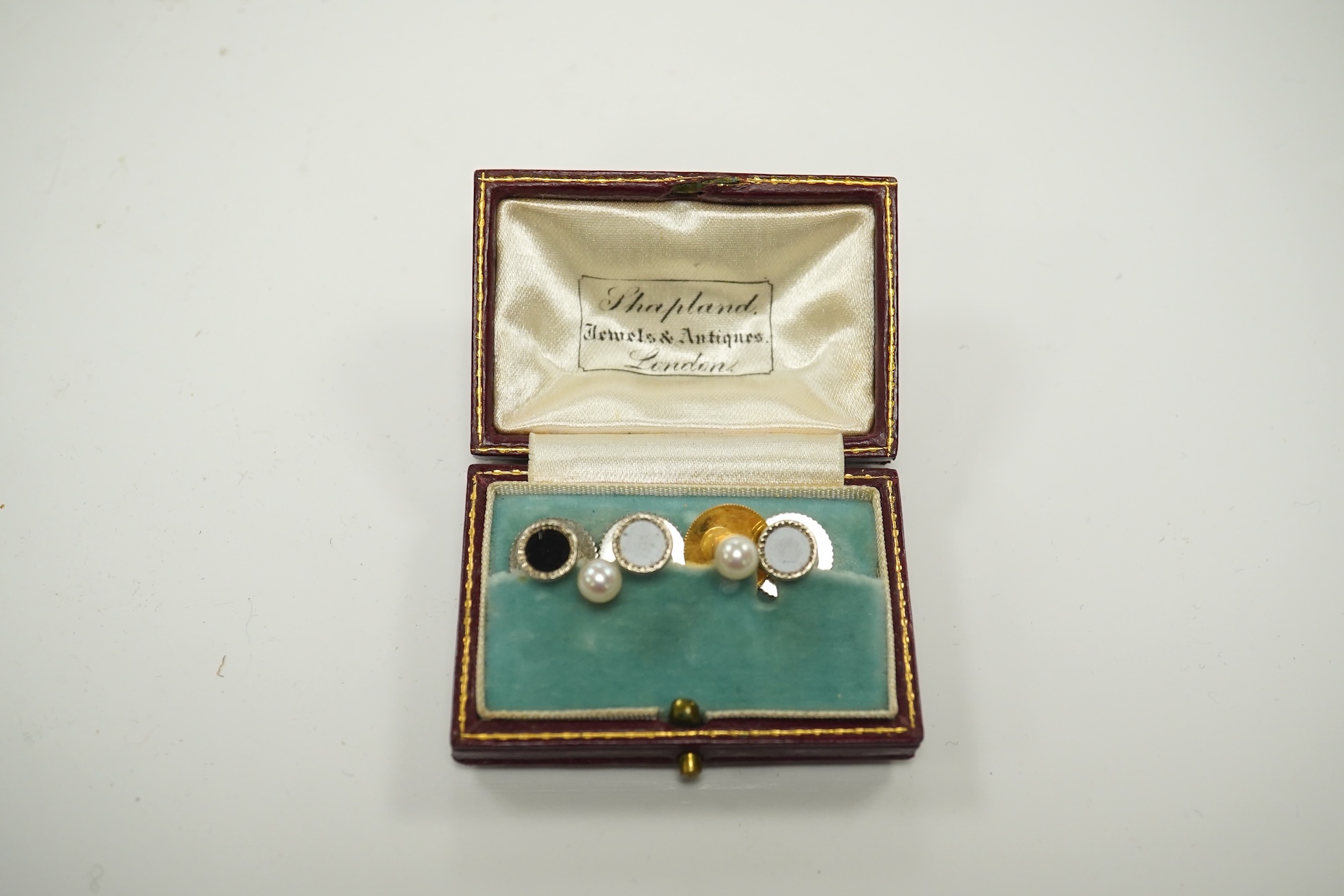 A 1930's four piece silver condiment set, a similar pair of peppermills and sundries. Condition - poor to fair